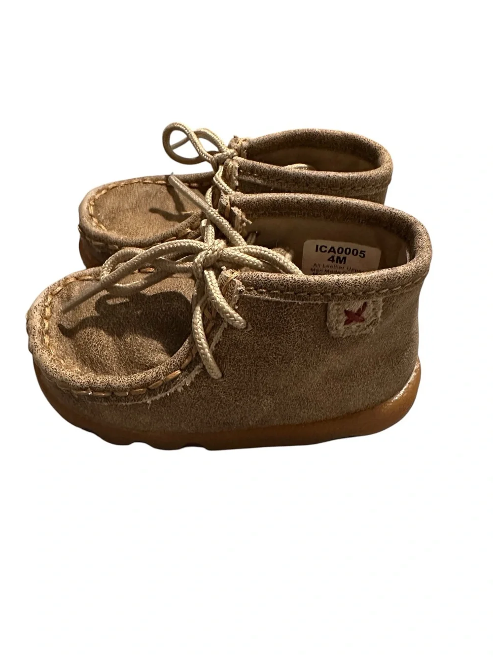 Twisted X brown bomber with a cream laces and a rubber outsole Size 4M